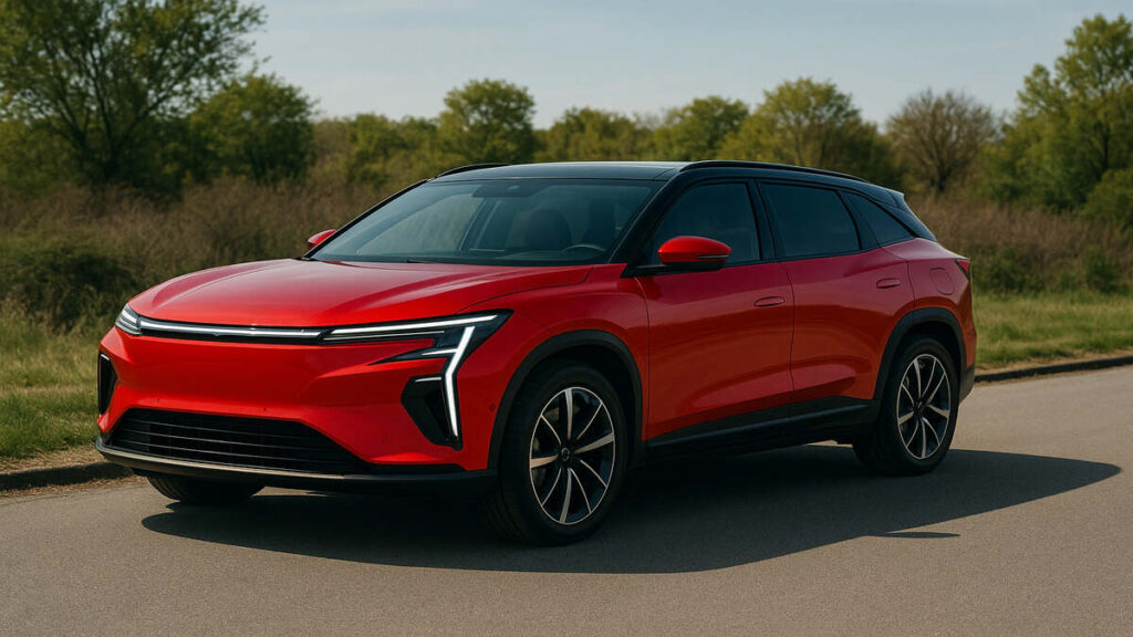 Red Mahindra XEV 9s electric SUV front view on road