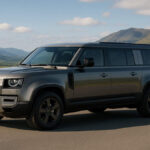 Land Rover Defender 130 parked on a scenic road