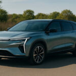 “Mahindra XEV 9s electric SUV front look on road”